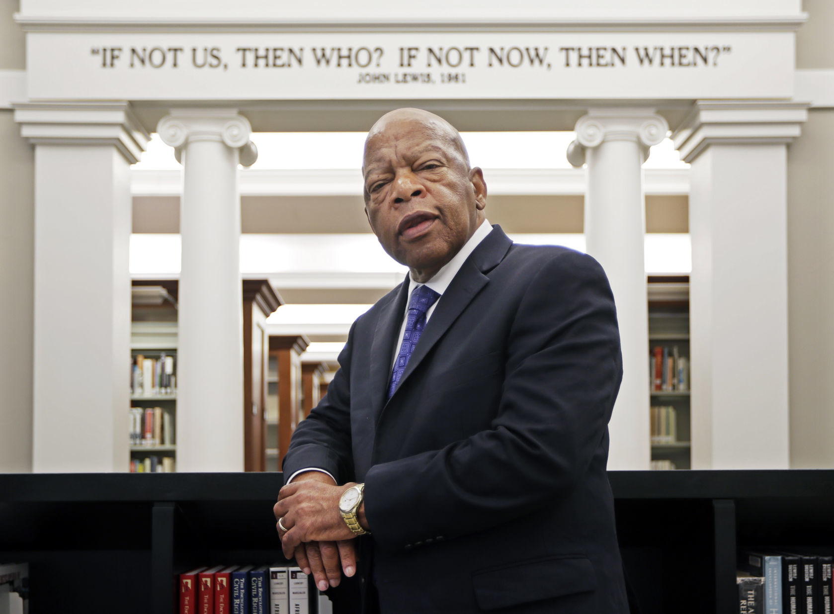 Posing for a photograph under his quote